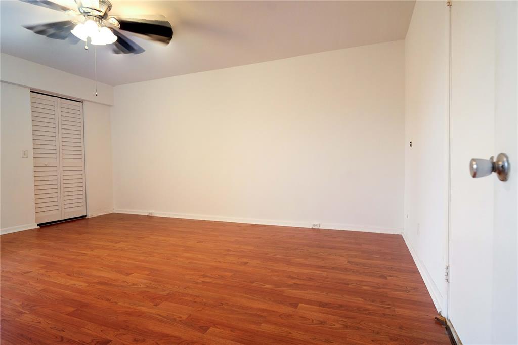 300 Southwest 134th Way, Unit 402E Pembroke Pines, FL 33027 - Photo 12 of 46 wooden floor in an empty room
