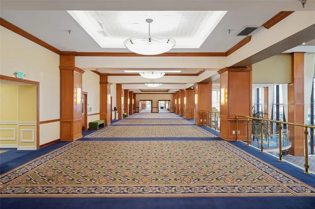 a very nice looking living room with furniture and a large window