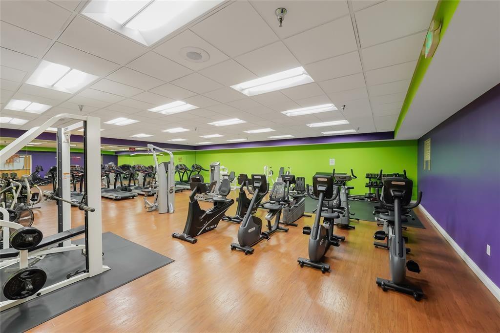 300 Southwest 134th Way, Unit 402E Pembroke Pines, FL 33027 - Photo 42 of 46 a view of a room with gym equipment