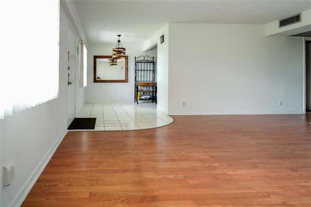300 Southwest 134th Way, Unit 402E Pembroke Pines, FL 33027 - Photo 7 of 46 a view of a kitchen with kitchen island a sink and dishwasher