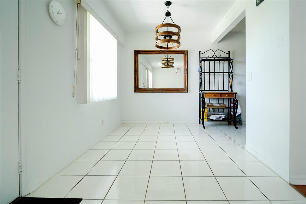 300 Southwest 134th Way, Unit 402E Pembroke Pines, FL 33027 - Photo 10 of 46 a view of an entryway with workspace