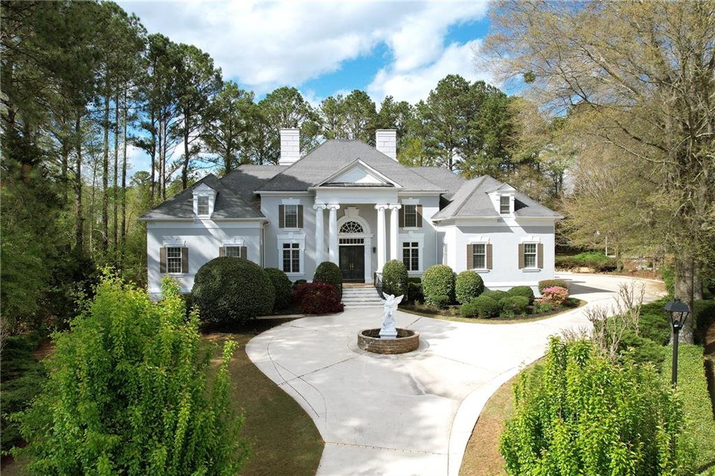 5360 Northwater Way Duluth, GA 30097 - Photo 1 of 62 a front view of a house with yard patio and green space