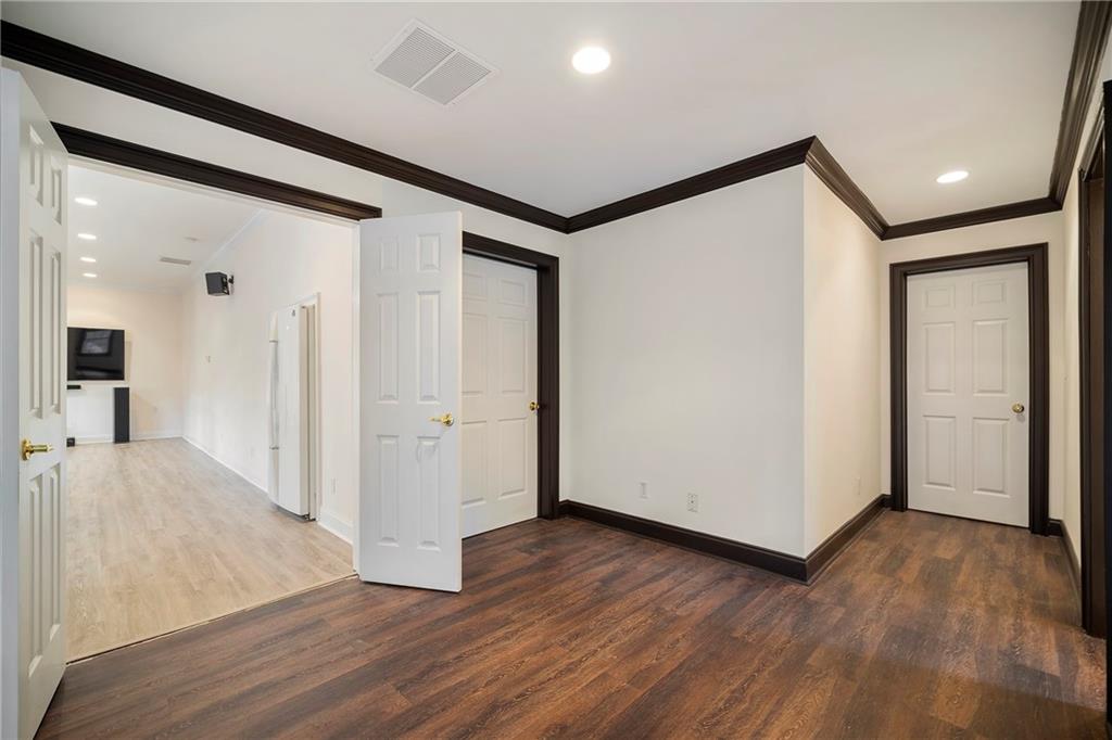 5360 Northwater Way Duluth, GA 30097 - Photo 43 of 62 a view of a hallway with wooden floor