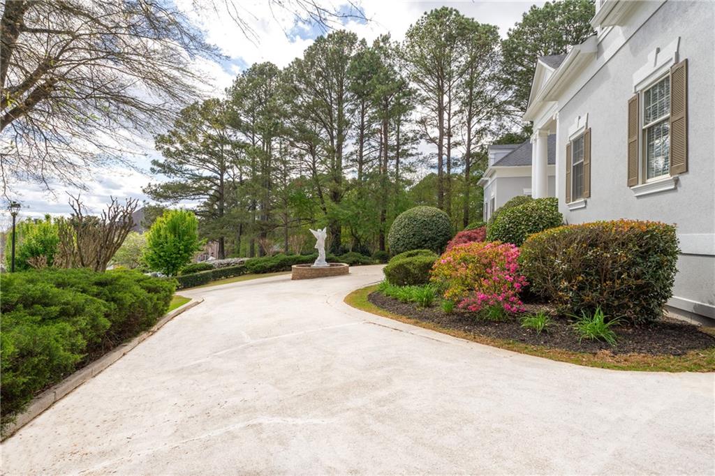 5360 Northwater Way Duluth, GA 30097 - Photo 50 of 62 a view of a garden with potted plants