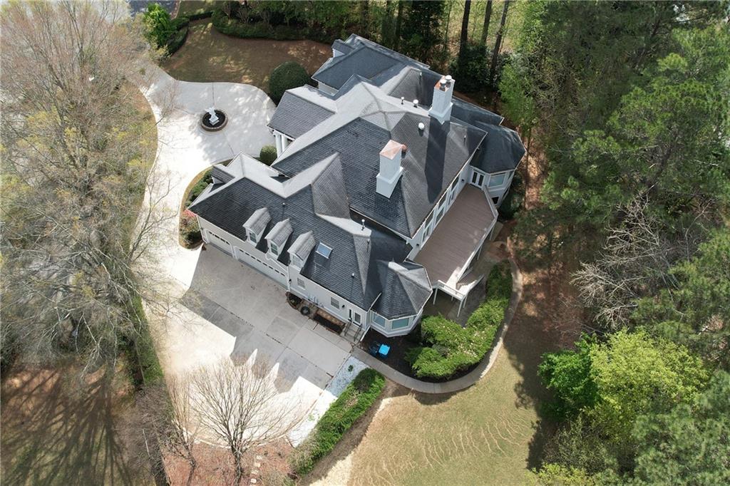 5360 Northwater Way Duluth, GA 30097 - Photo 59 of 62 an aerial view of a house with garden space and street view