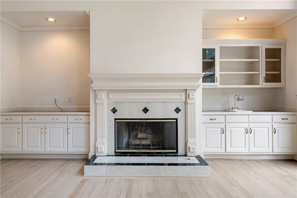 5360 Northwater Way Duluth, GA 30097 - Photo 9 of 62 a hallway with fireplace