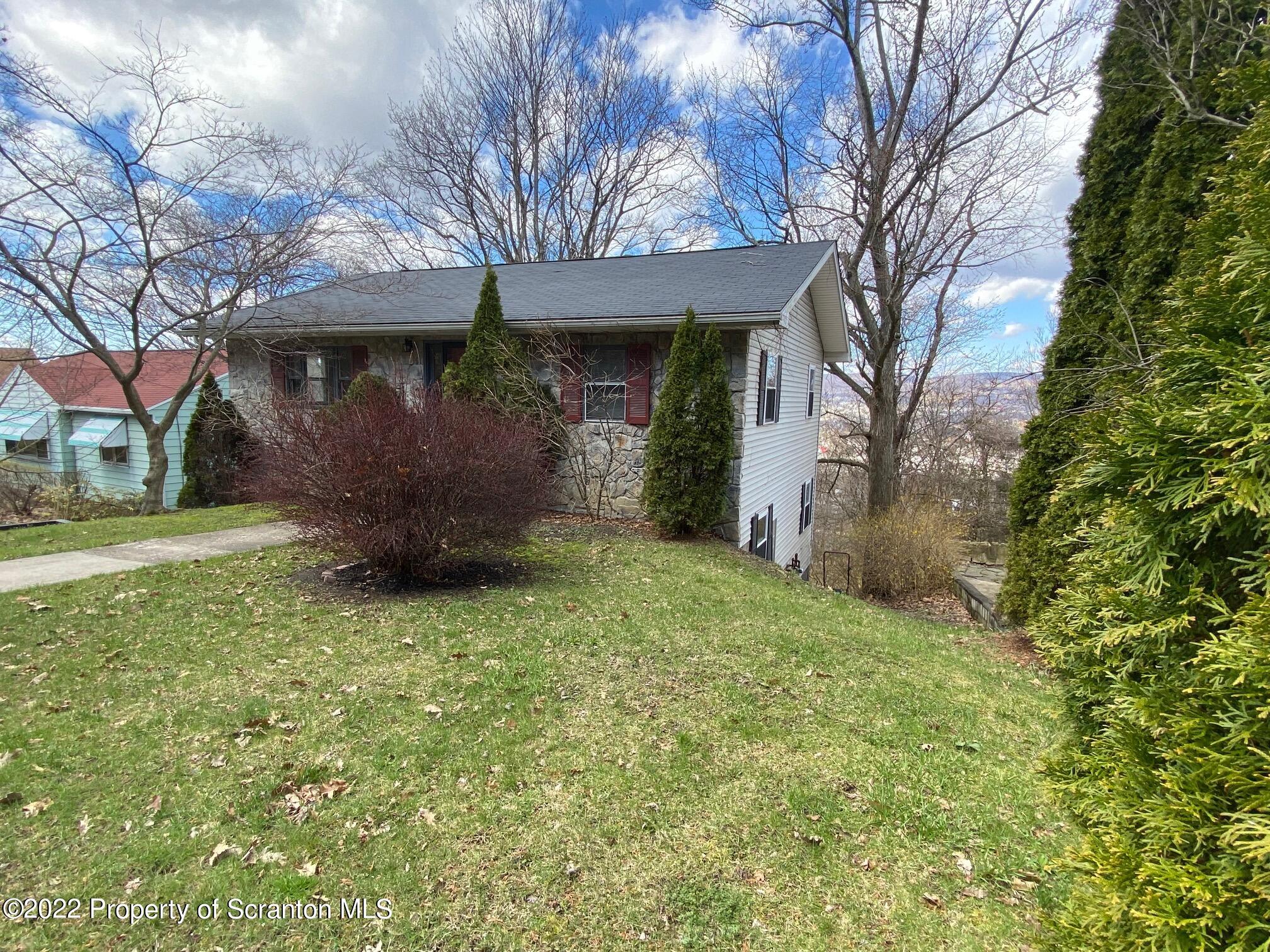 23 East Mountain Road Scranton, PA 18505 - Photo 4 of 26 a view of a house with a back yard