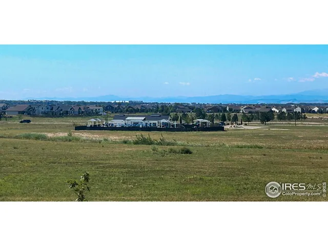 a view of an ocean and city