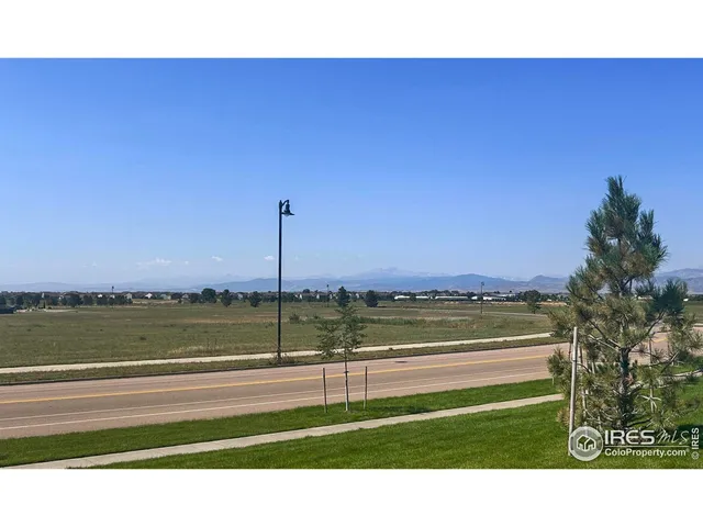 a view of an ocean and city