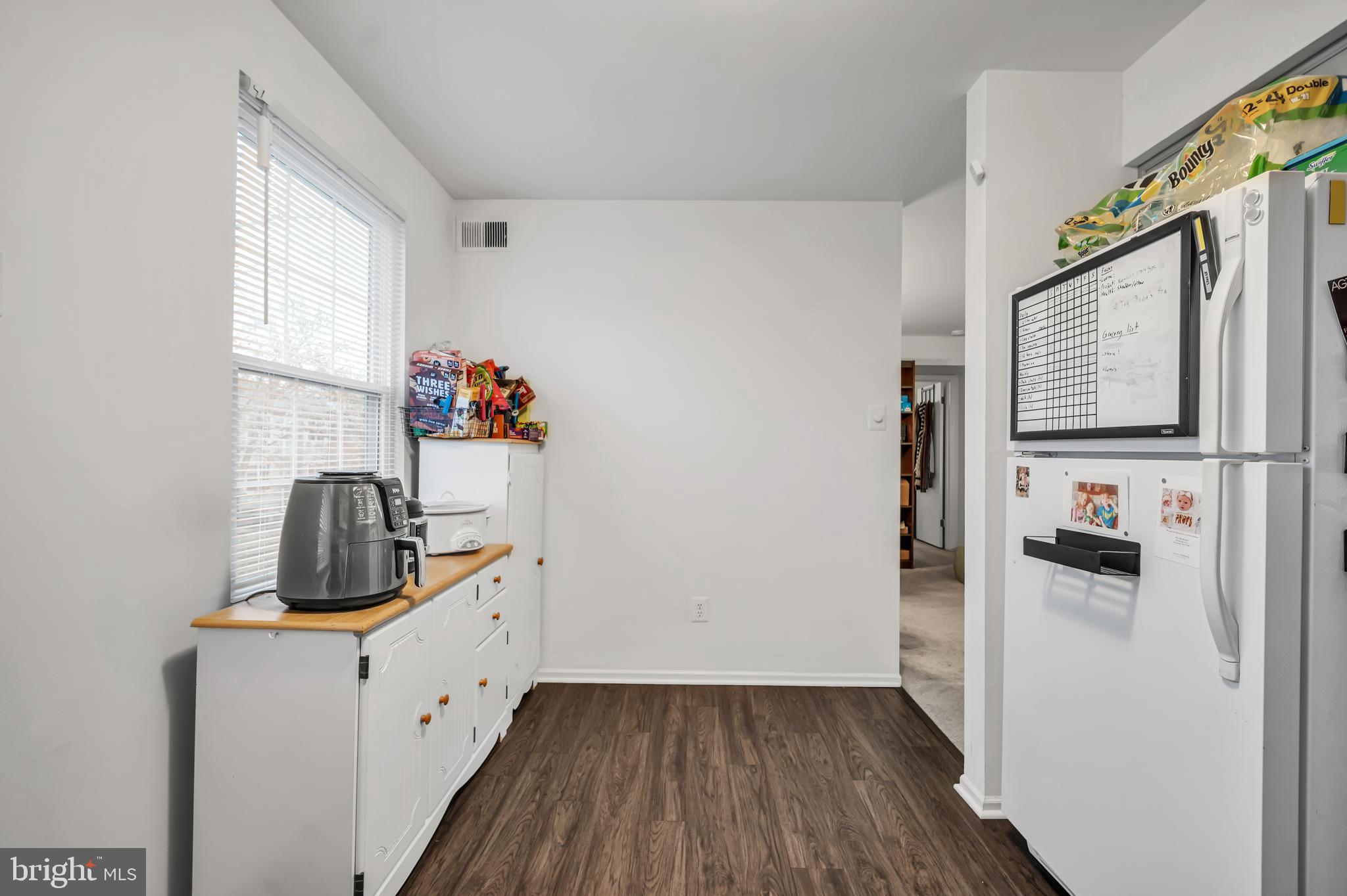 604 Wrensong Road Yardley, PA 19067 - Photo 14 of 37 a view of kitchen with furniture and wooden floor