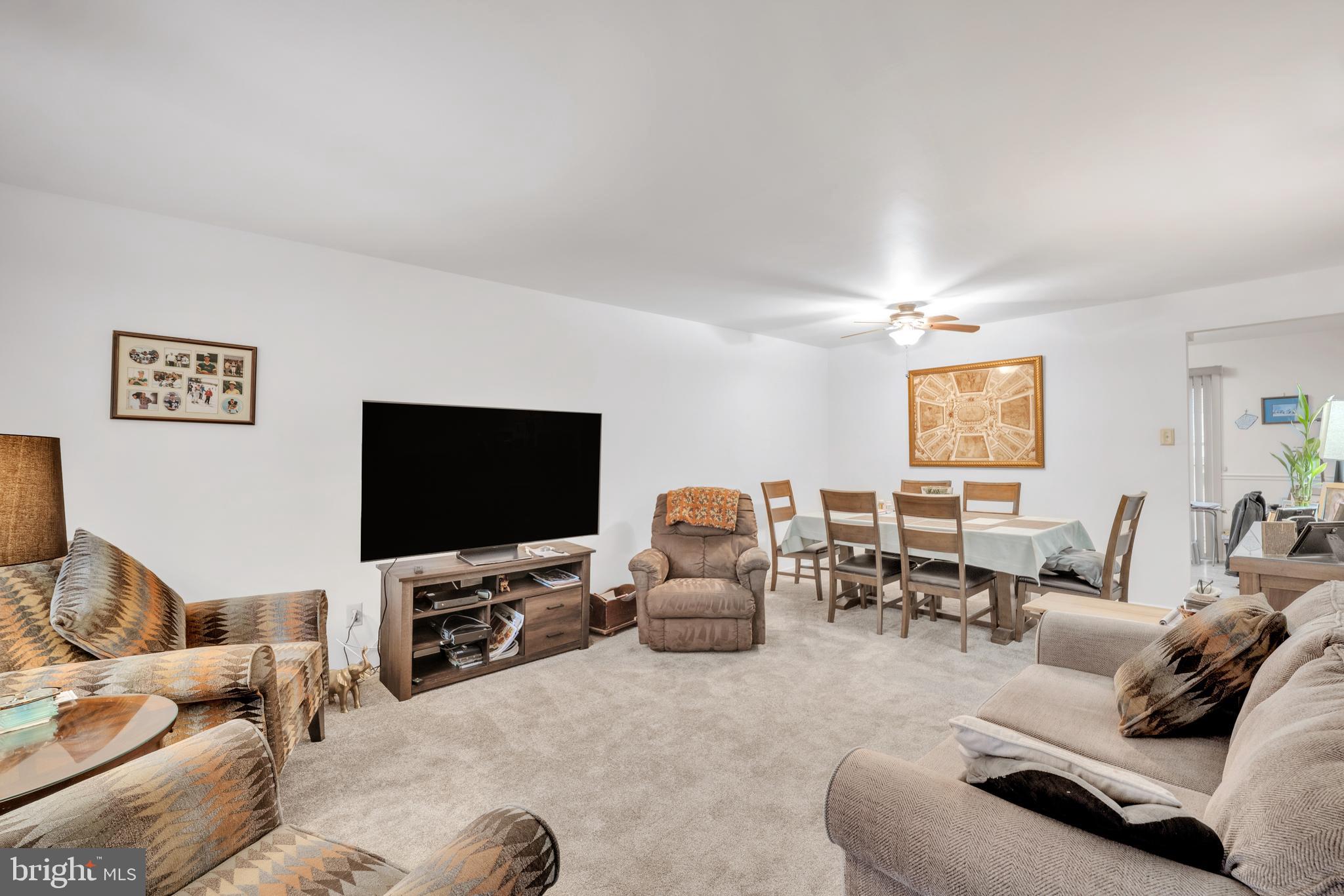 604 Wrensong Road Yardley, PA 19067 - Photo 27 of 37 a living room with furniture and a flat screen tv