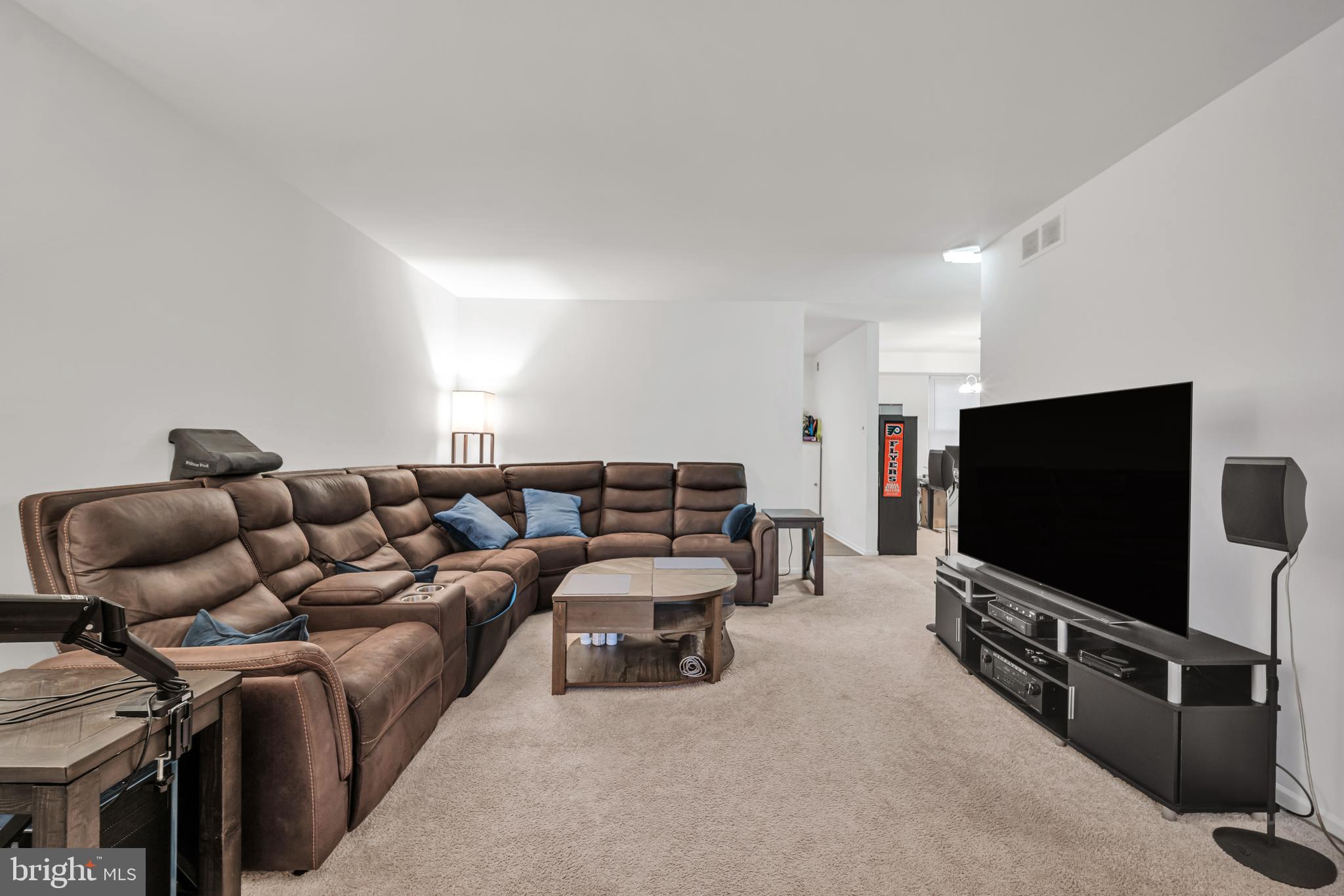 604 Wrensong Road Yardley, PA 19067 - Photo 10 of 37 a living room with furniture and a flat screen tv