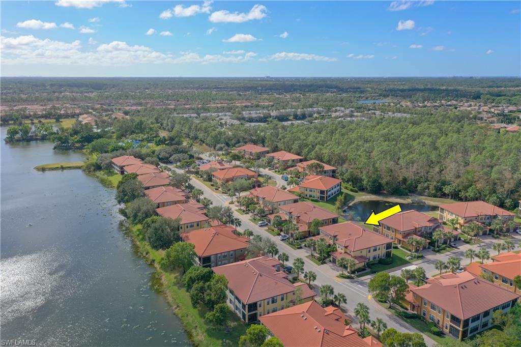 1303 Verde Drive, Unit 1603 Naples, FL 34105 - Photo 15 of 17 Birds eye view of property featuring a water view