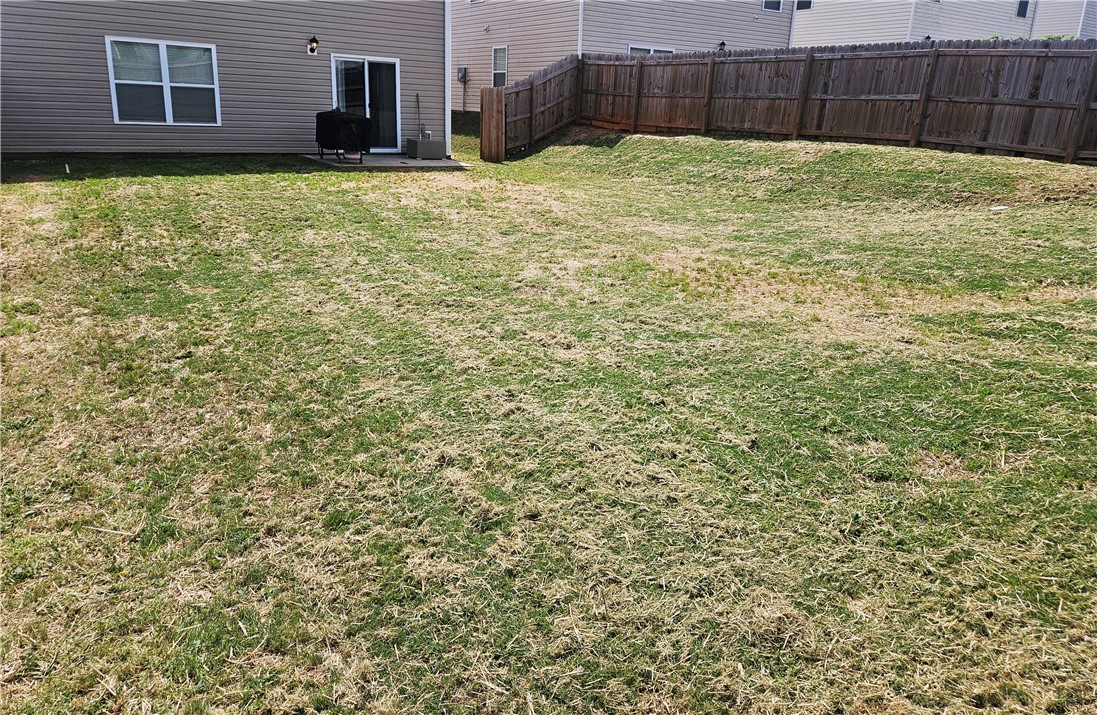 902 Ashwood Lane Easley, SC 29640 - Photo 5 of 39 A fenced backyard offers a private outdoor space for leisure and recreation.