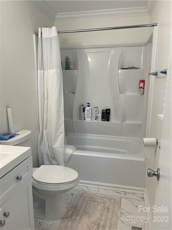 5940 Trotters Ridge Road Charlotte, NC 28227 - Photo 28 of 41 a bathroom with a toilet and a shower