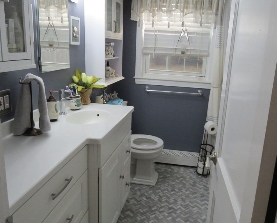 75 Colasanti Road Weymouth, MA 02191 - Photo 19 of 30 a bathroom with a sink toilet and shower
