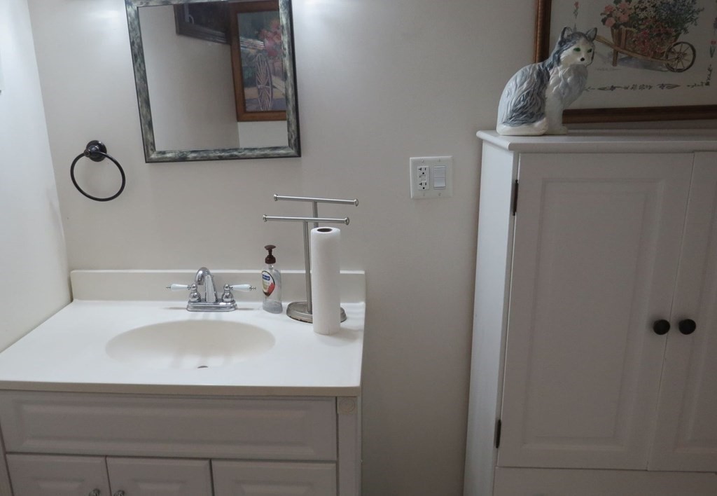 75 Colasanti Road Weymouth, MA 02191 - Photo 23 of 30 a bathroom with a sink and a mirror