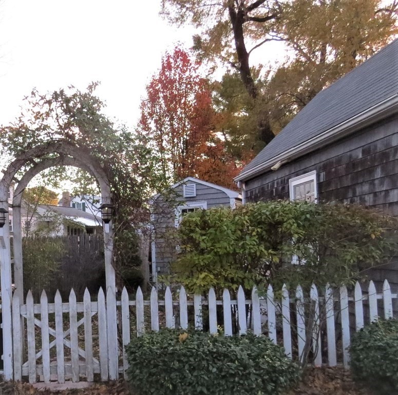 75 Colasanti Road Weymouth, MA 02191 - Photo 3 of 30 a view of a brick house with a large trees