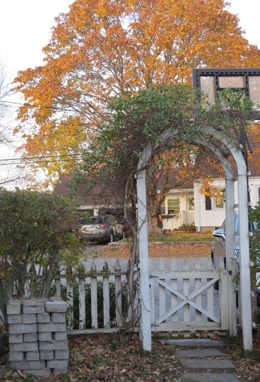 75 Colasanti Road Weymouth, MA 02191 - Photo 4 of 30 a view of a brick house with a yard