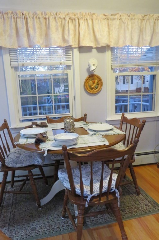 75 Colasanti Road Weymouth, MA 02191 - Photo 6 of 30 a view of a dining room with furniture and chandelier