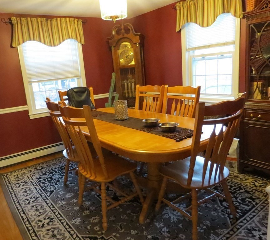 75 Colasanti Road Weymouth, MA 02191 - Photo 9 of 30 a view of a dining room with furniture and window