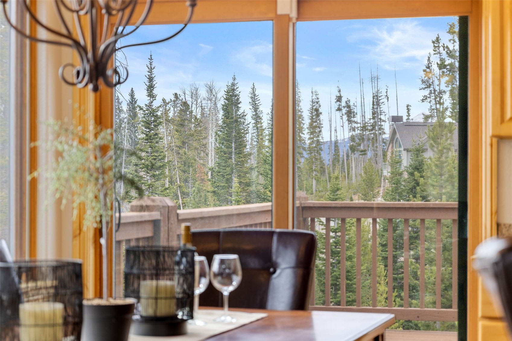 91795 Ryan Gulch Road Silverthorne, CO 80498 - Photo 22 of 50 a view of a city from a dining room