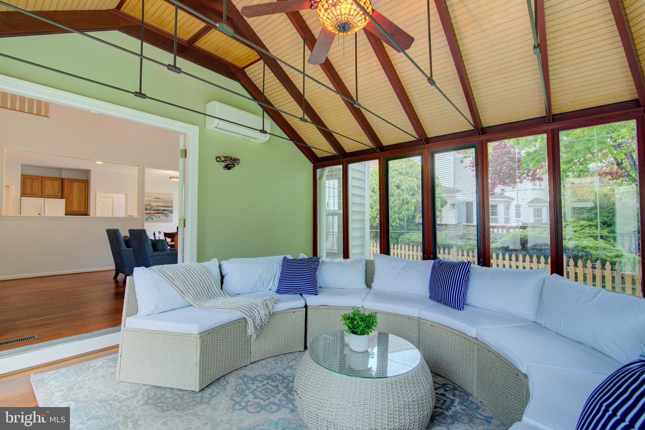 12719 Hitchcock Court Reston, VA 20191 - Photo 13 of 55 a living room with furniture and a large window