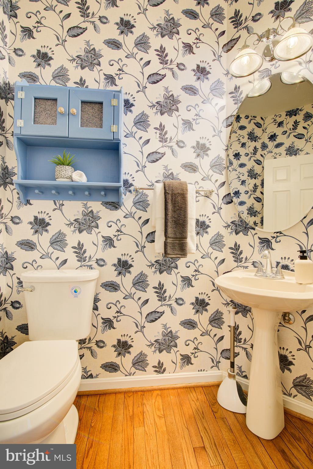 12719 Hitchcock Court Reston, VA 20191 - Photo 14 of 55 a bathroom with a sink and a toilet