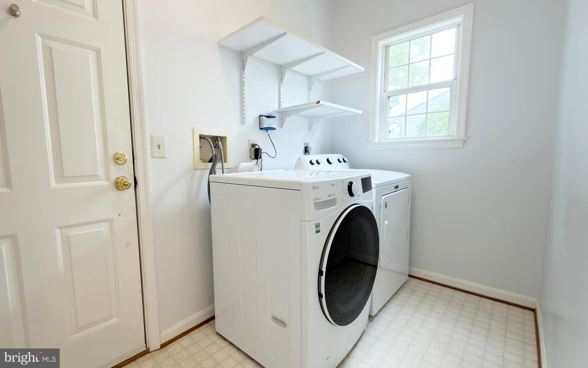 12719 Hitchcock Court Reston, VA 20191 - Photo 21 of 55 a utility room with dryer and washer