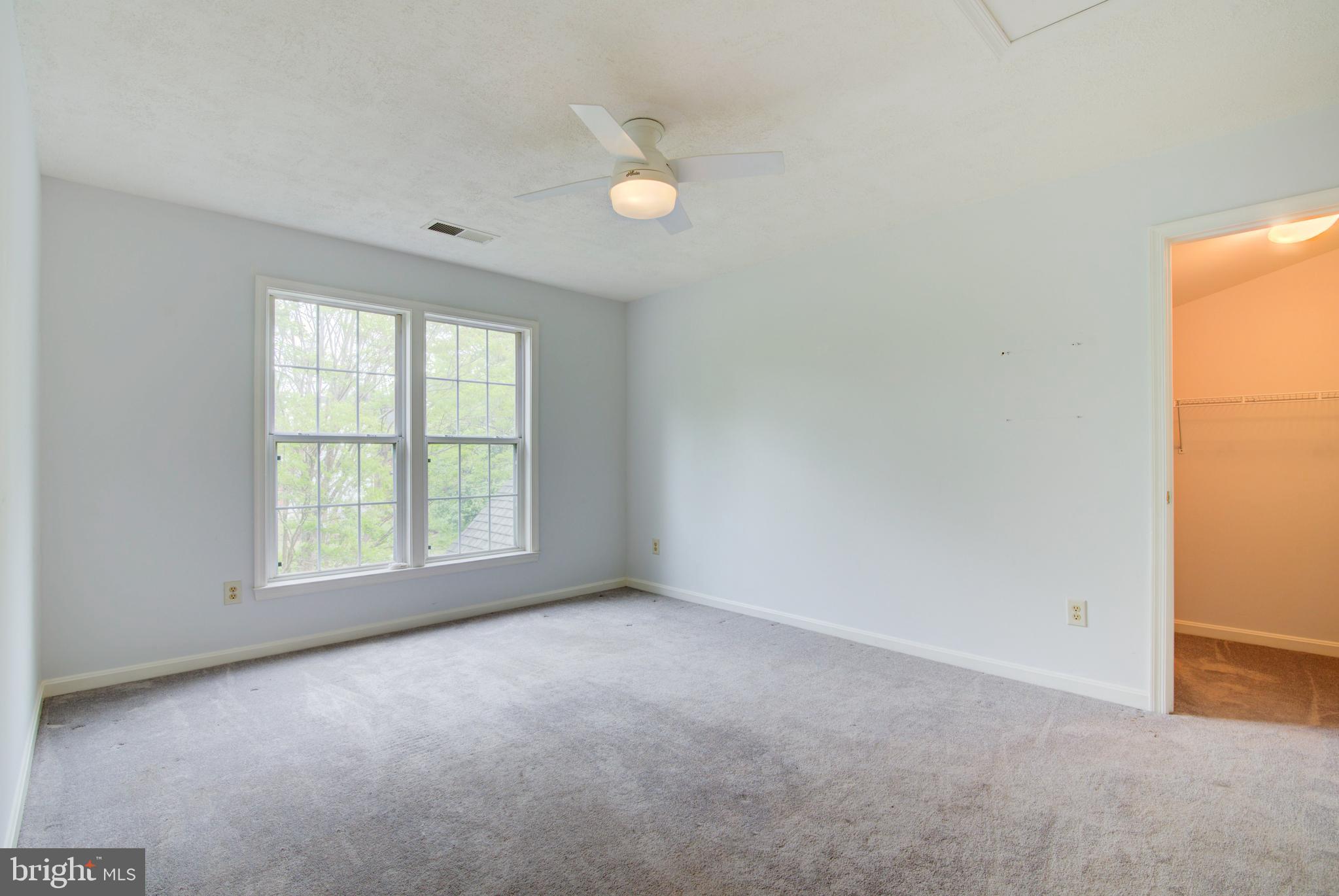 12719 Hitchcock Court Reston, VA 20191 - Photo 30 of 55 an empty room with windows