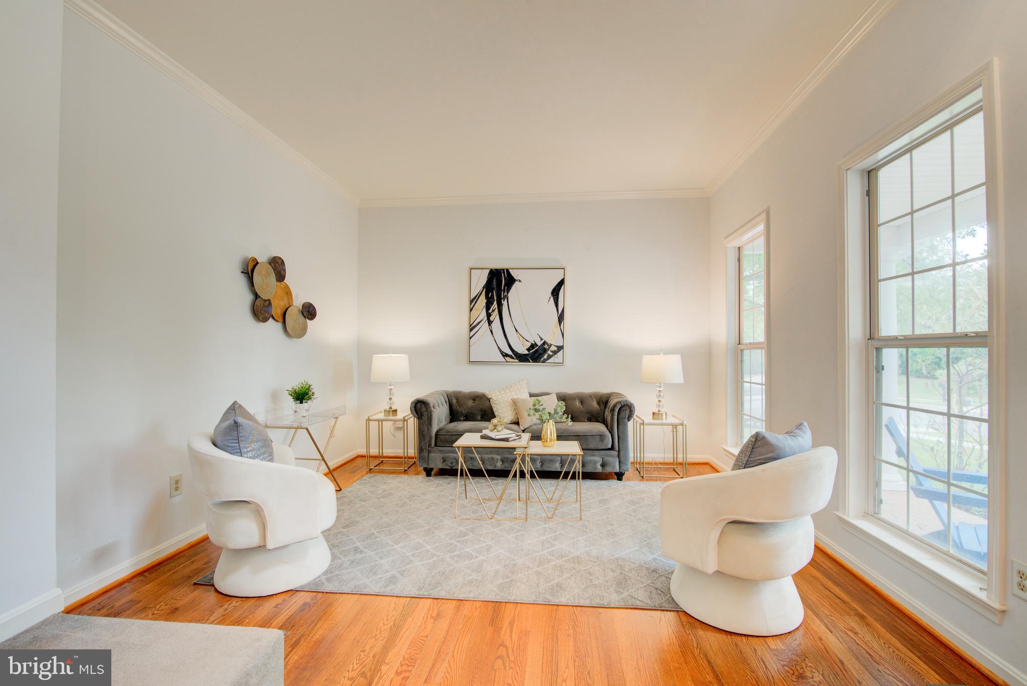 12719 Hitchcock Court Reston, VA 20191 - Photo 4 of 55 a living room with furniture