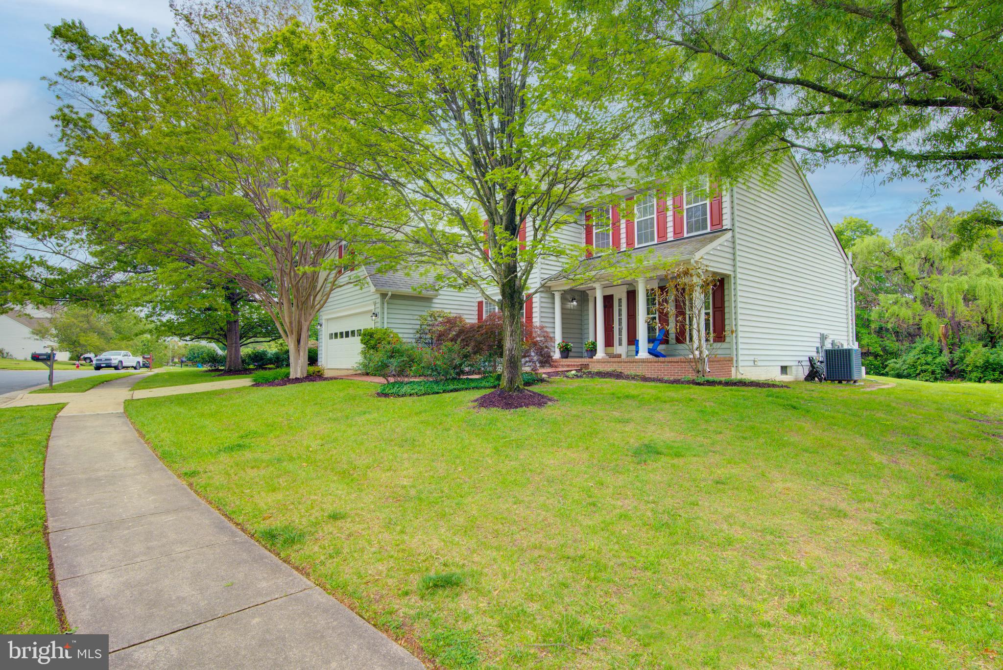 12719 Hitchcock Court Reston, VA 20191 - Photo 51 of 55 a view of a house with a big yard plants and large trees