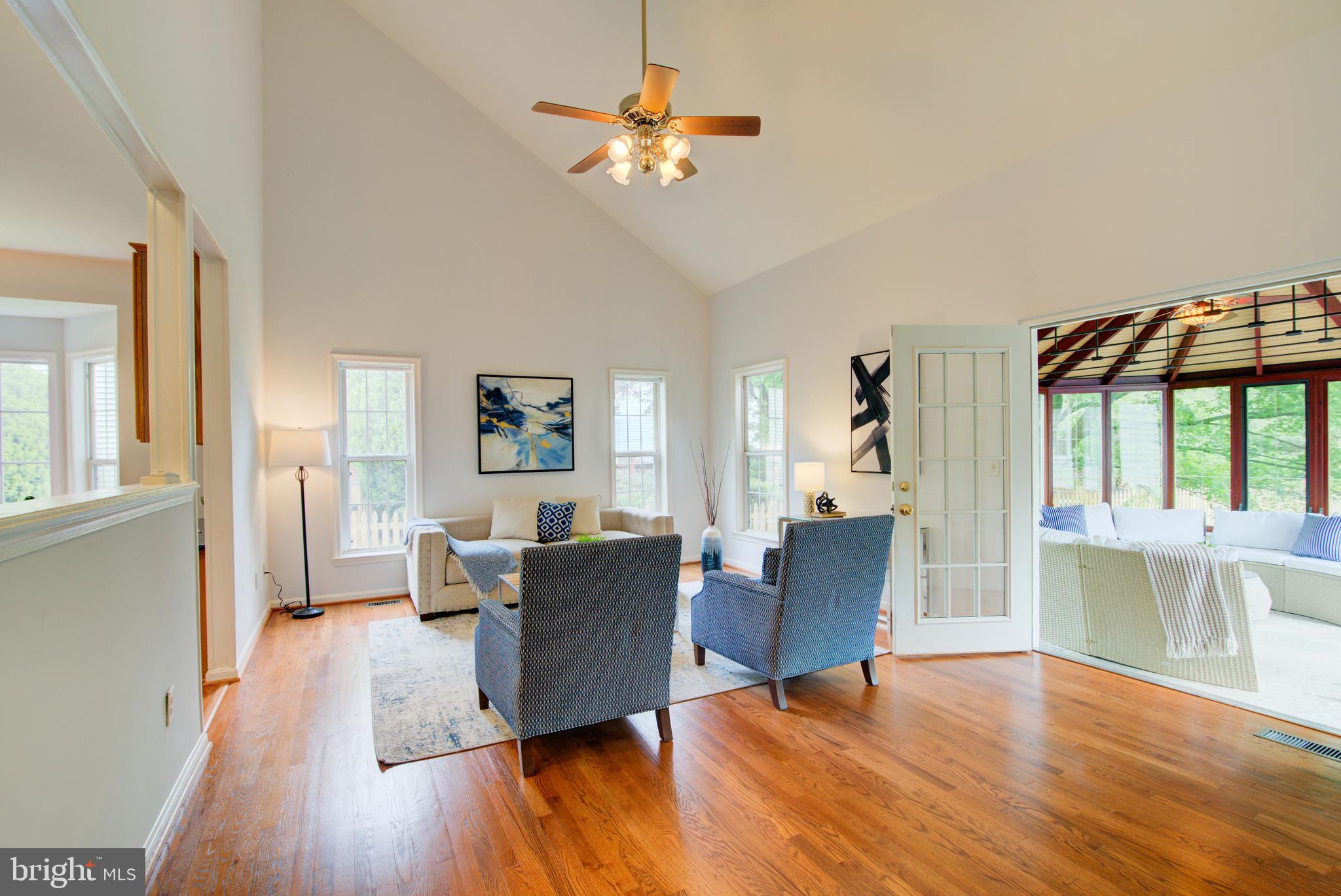 12719 Hitchcock Court Reston, VA 20191 - Photo 9 of 55 a living room with furniture and a large window