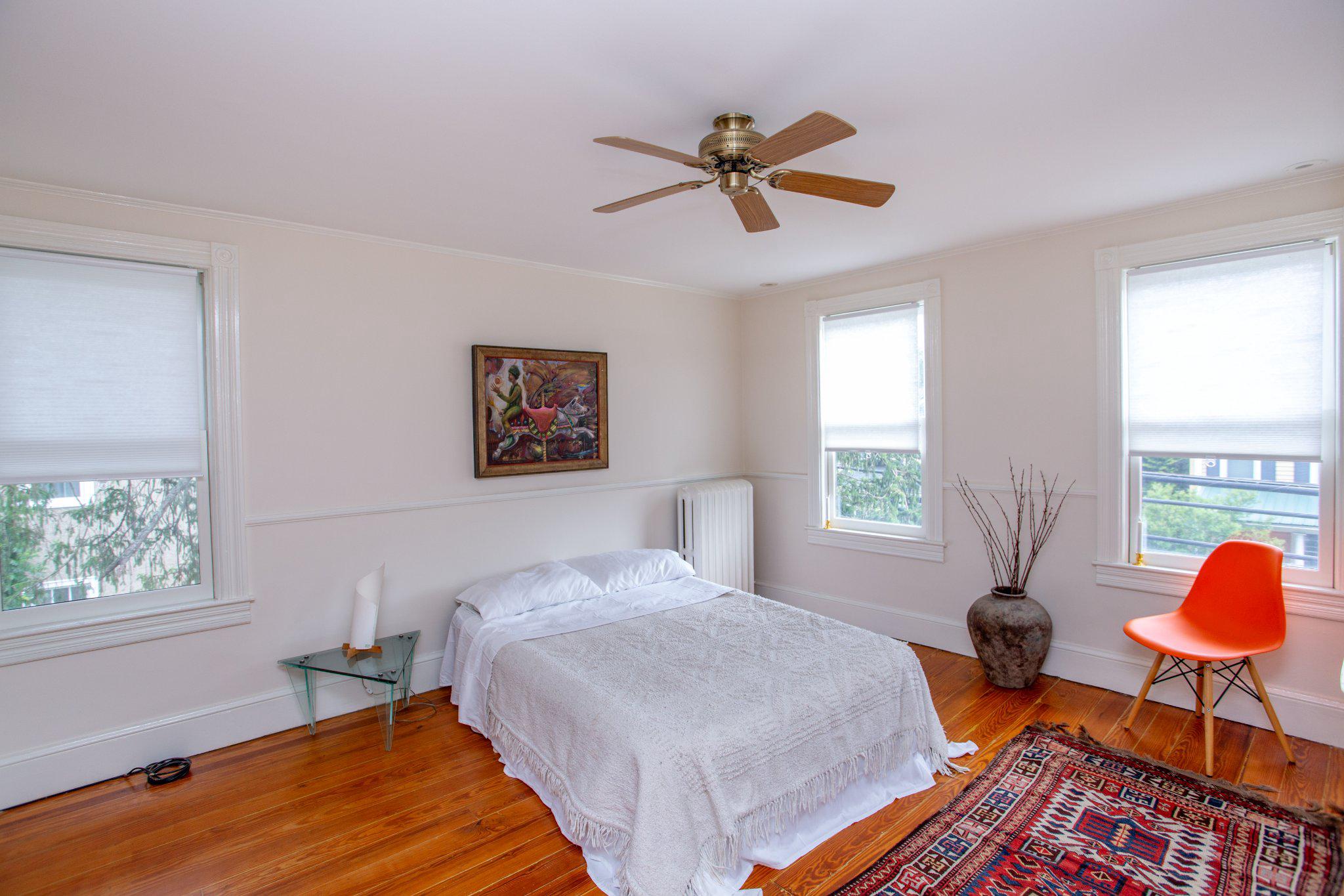 3 South Main Street Stockton, NJ 08559 - Photo 14 of 42 a bedroom with a bed and a chandelier