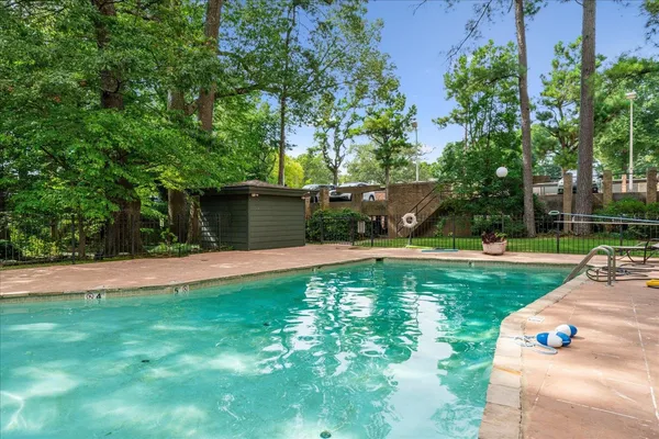 a view of a backyard with a garden