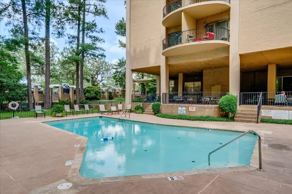 a view of a house with a swimming pool