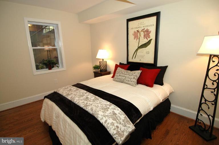 3318 R Street Northwest Washington, DC 20007 - Photo 14 of 26 a bedroom with bed and window