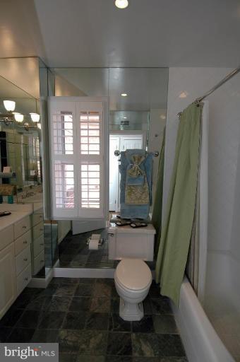 3318 R Street Northwest Washington, DC 20007 - Photo 18 of 26 a bathroom with a sink toilet and shower