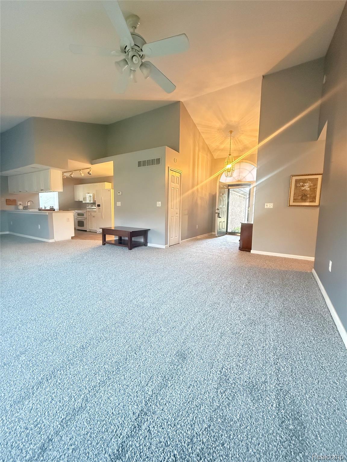 34917 Chickadee Ridge Richmond, MI 48062 - Photo 5 of 32 Vaulted ceilings with a ceiling fan, recessed lighting, and soft carpet flooring