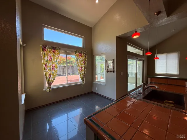 a room with furniture and window