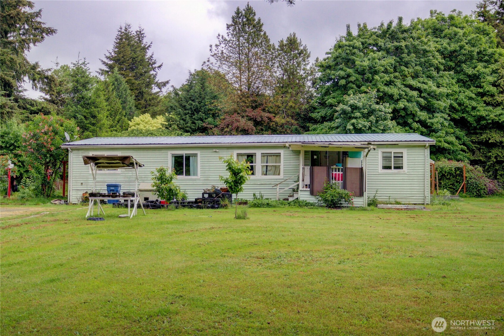 7185 Old Highway 99 North Road Burlington, WA 98233 - Photo 1 of 26 a view of a house with a outdoor space
