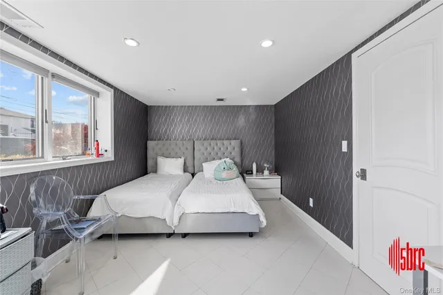 a bedroom with a bed and a table in it