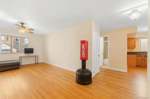 a kitchen with a refrigerator and a sink