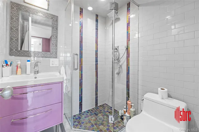 a living room with hard wood floors and a table