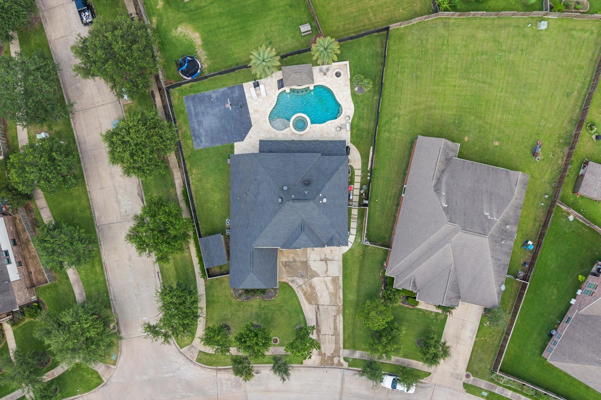 14016 Savannah Landing Lane Rosharon, TX 77583 - Photo 48 of 49 an aerial view of a house with outdoor space and a lake view
