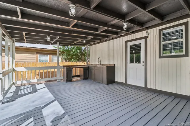 a picture of a bathroom with a shower