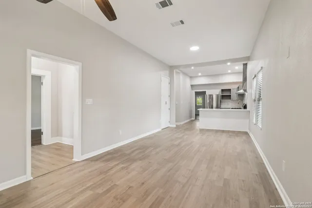 a room with a bed and a view of bathroom