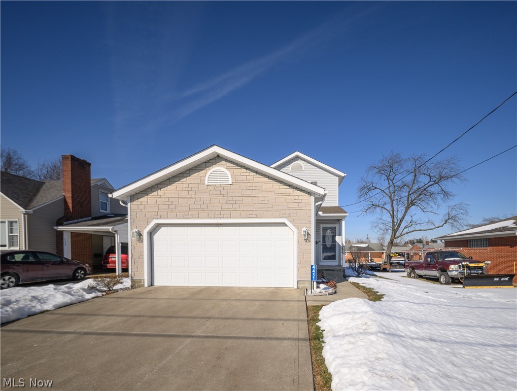4431 7th Street Northwest Canton, OH 44708 - Photo 18 of 23 View of front of home with a garage and driveway