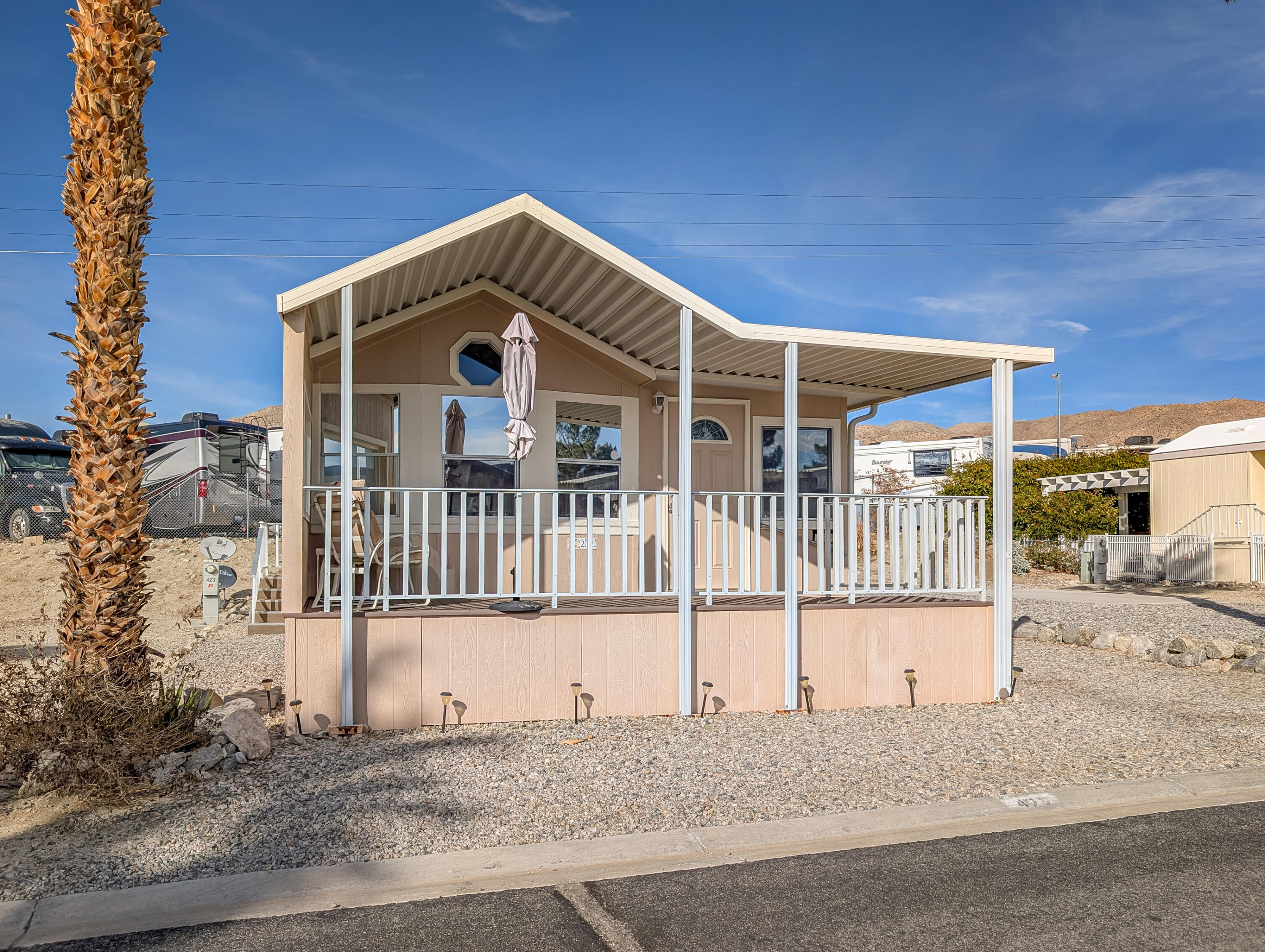 a front view of a house with a fence