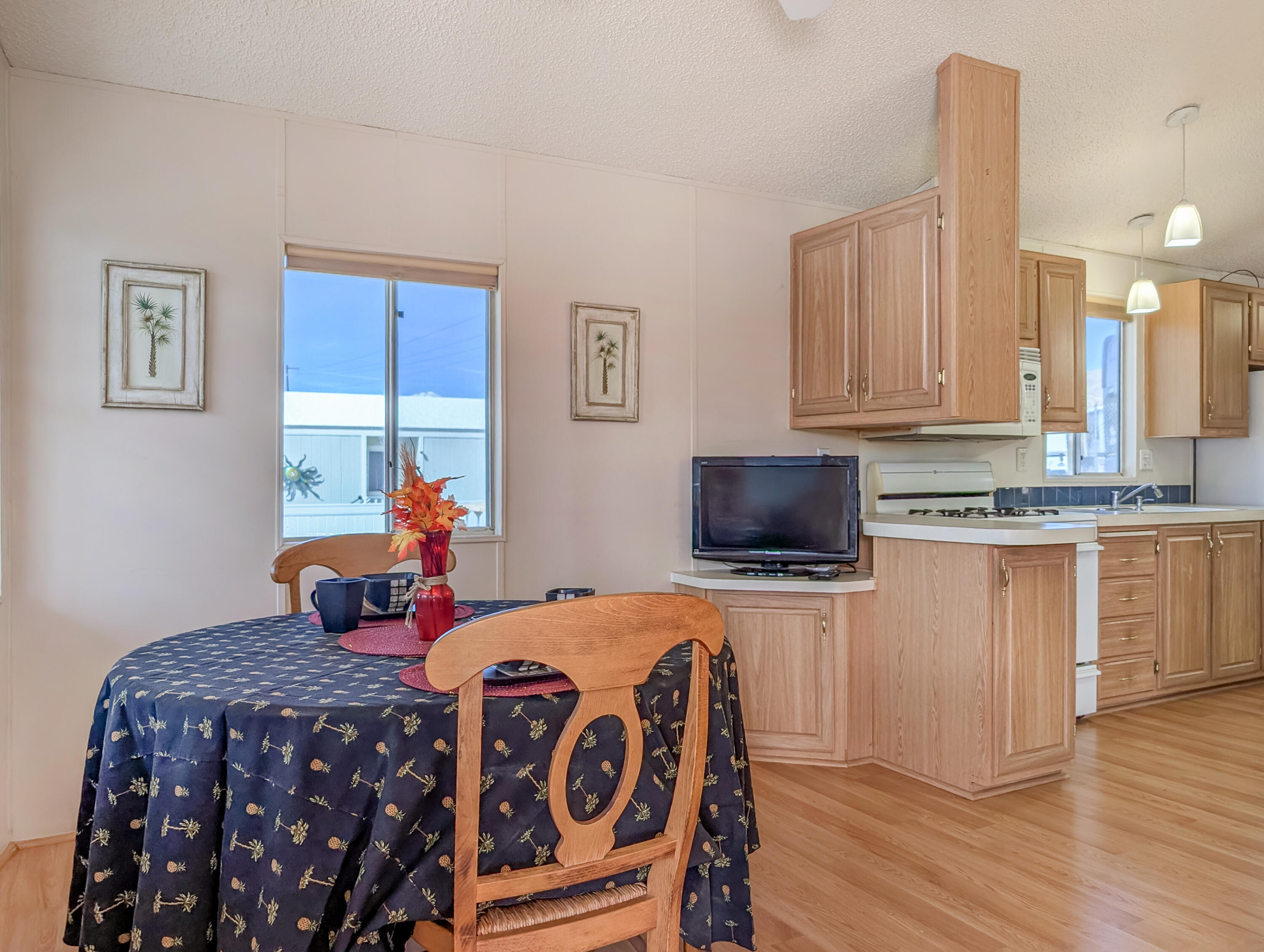 70200 Dillon Road, Unit 422 Desert Hot Springs, CA 92241 - Photo 12 of 25 a bed room with a bed and a television